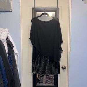 A fancy cocktail black dress